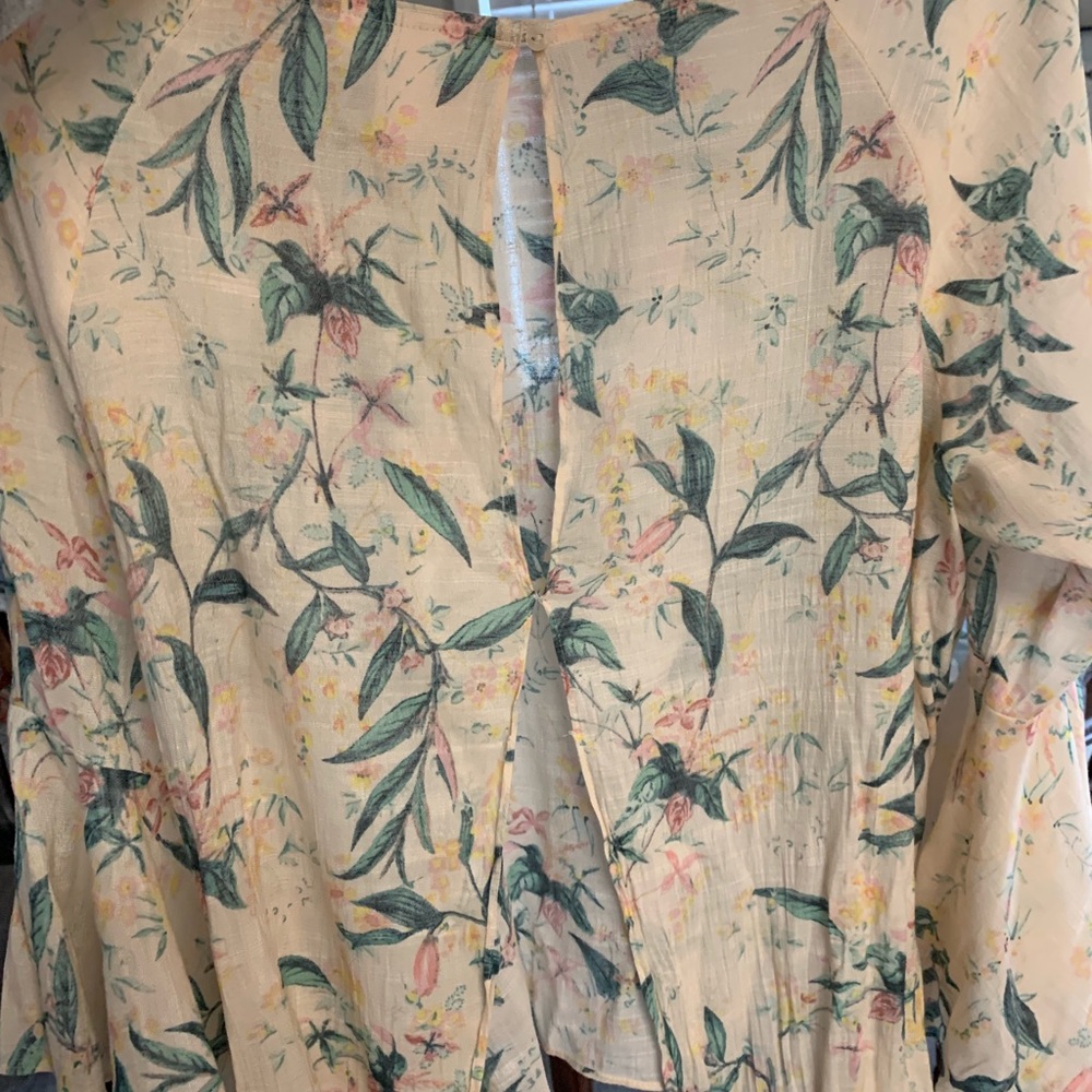 Flowy Lauren Conrad top with open back